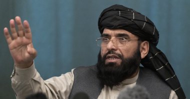 Suhail Shaheen, Afghan Taliban spokesperson and a member of the negotiation team, gestures while speaking during a joint news conference in Moscow, Russia, March 19, 2021. (AP File Photo)