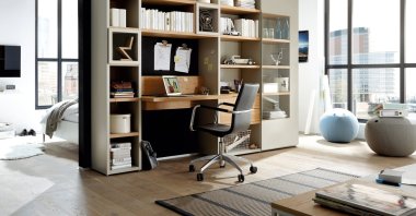 Shelves with integrated desk are a space-saving home office solution. (dpa Photo) 