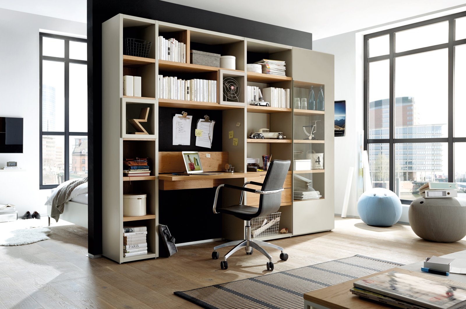 Shelves with integrated desk are a space-saving home office solution. (dpa Photo) 