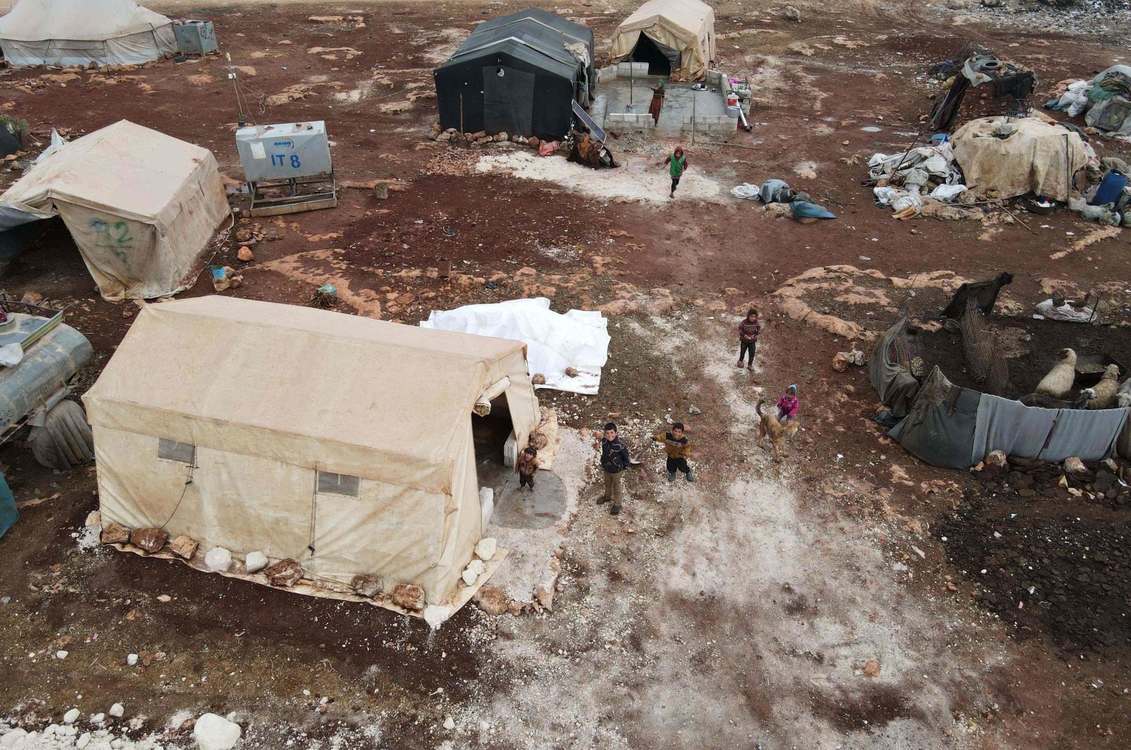 This aerial view shows children in the Bardaqli camp for displaced people in the town of Dana in the northwestern Idlib province, Syria, on Nov. 20, 2021. (AFP Photo)