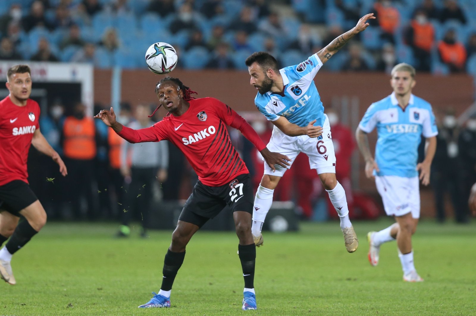Trabzonspor&#039;s Siopis (R) in action with Gaziantep FK&#039;s Hamza Mendyl during the Turkish Süper Lig 13th week match at the Medical Park Stadium in Trabzon, Turkey, Nov. 22, 2021 (AA Photo)