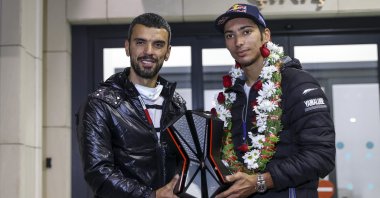 The 2021 Superbike World Championship title winner Toprak Razatlıoğlu (L) is received by Turkish Motorcycling Federation (TMF) national team captain and Justice and Development Party (AK Party) deputy, Kenan Sofuoğlu, Istanbul, Turkey, Nov. 23, 2021. (AA Photo)