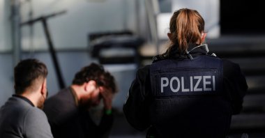 German police officers detain two migrants, reportedly coming from Iraq through Belarus and Poland, during a patrol near the German-Polish border, in Frankfurt (Oder), Germany, Oct. 28, 2021. (Reuters File Photo)