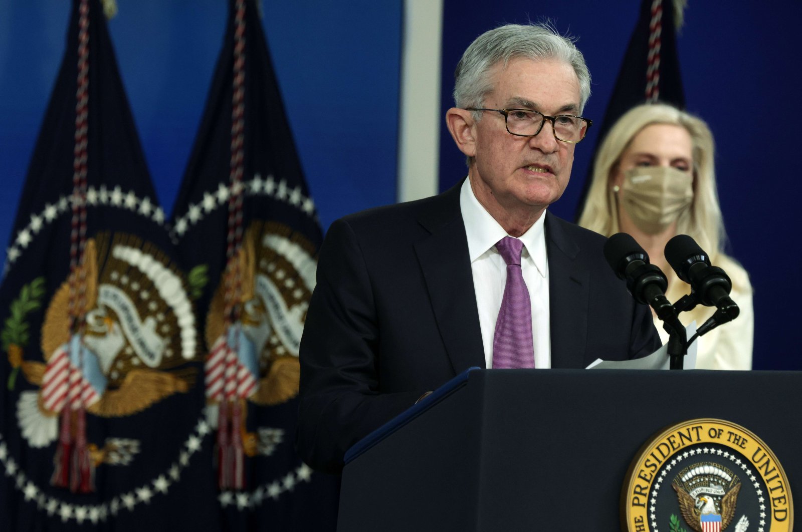 U.S. Federal Reserve (Fed) Chair Jerome Powell (L) speaks as Lael Brainard (R) listens during an announcement at the South Court Auditorium of Eisenhower Executive Office Building, in Washington, D.C., U.S., Nov. 22, 2021. (AFP Photo)