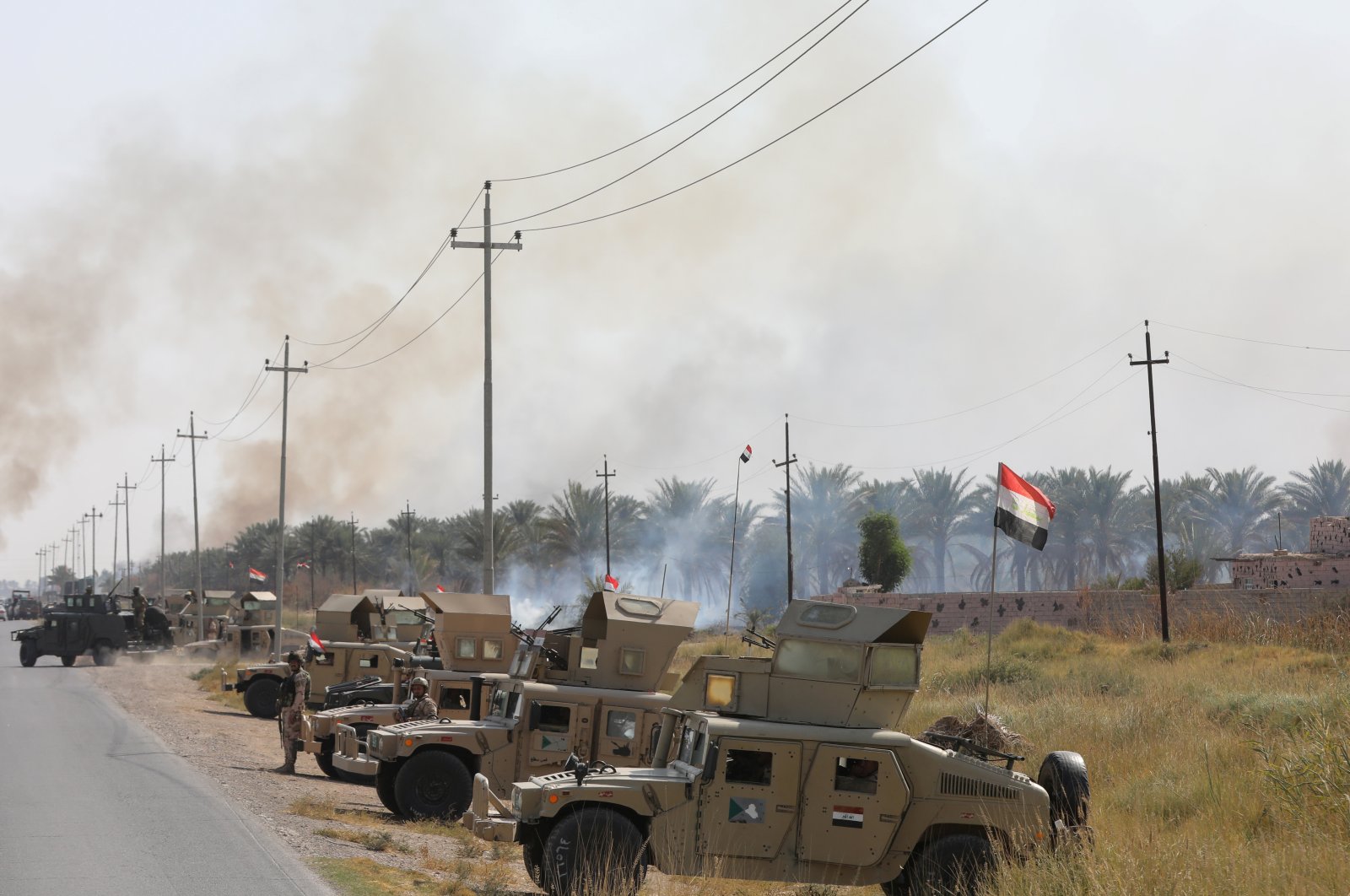 Military vehicles of Iraqi security forces are seen after an attack by Daesh terrorists, near Muqdadiya, Iraq, Oct. 27, 2021. (Reuters File Photo)