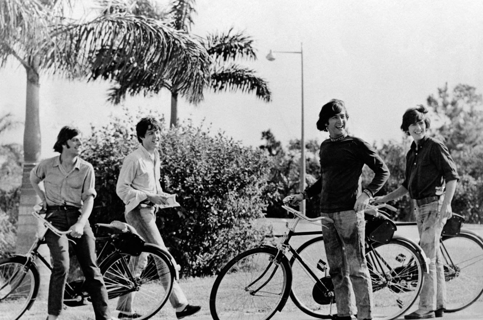 The singers, musicians and members of the English band The Beatles, John Lennon, Paul McCartney, George Harrison and Ringo Starr having fun riding bicycles in the 1960s. (Getty Images)