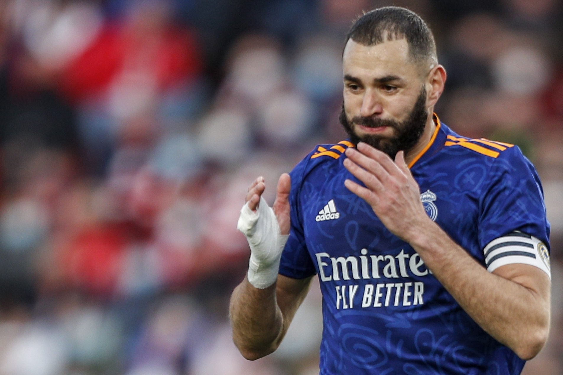 Real Madrid's Karim Benzema reacts after failing a chance to score during a Spanish La Liga soccer match between Granada and Real Madrid at Los Carmenes stadium in Granada, Spain, Nov. 21, 2021. (AP Photo)