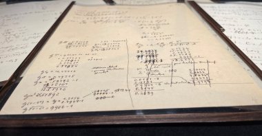 A page of the Einstein-Besso manuscript, a 54-page working manuscript written jointly by Albert Einstein and Michele Besso between June 1913 and early 1914, is displayed at Christie&#039;s auction house in Paris, France, Nov. 22, 2021. (Reuters Photo) 