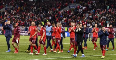 Switzerland players celebrate after beating Northern Ireland during the 2022 FIFA World Cup Qualifier match between Switzerland and Northern Ireland at Stade de Geneve, Geneva, Switzerland, Oct. 9, 2021. (Photo by Getty Images)