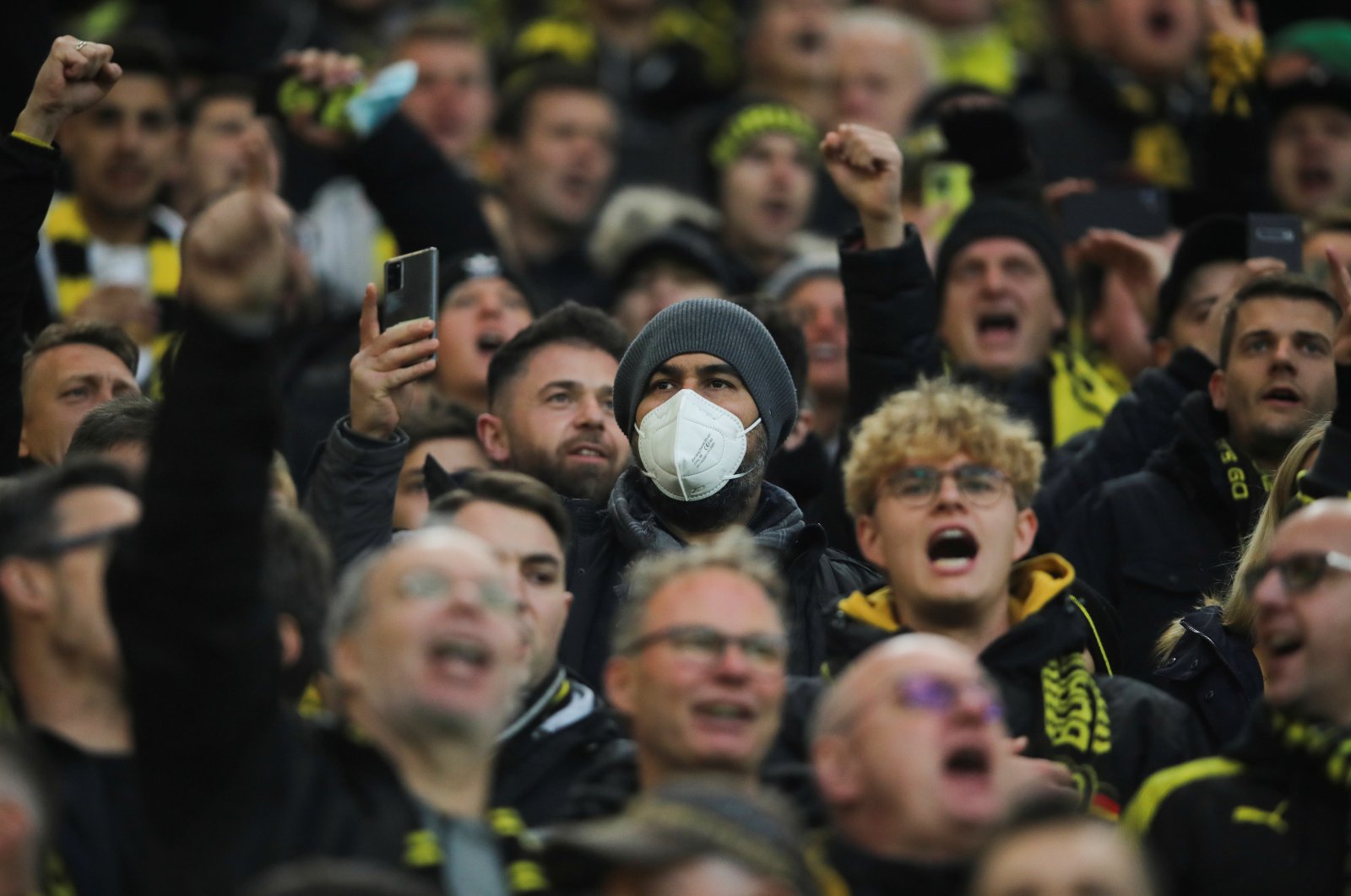 A Borussia Dortmund fan wears a protective face mask during a match against VfB Stuttgart at the Signal Iduna Park, Germany, Nov. 20, 2021. (Reuters Photo)