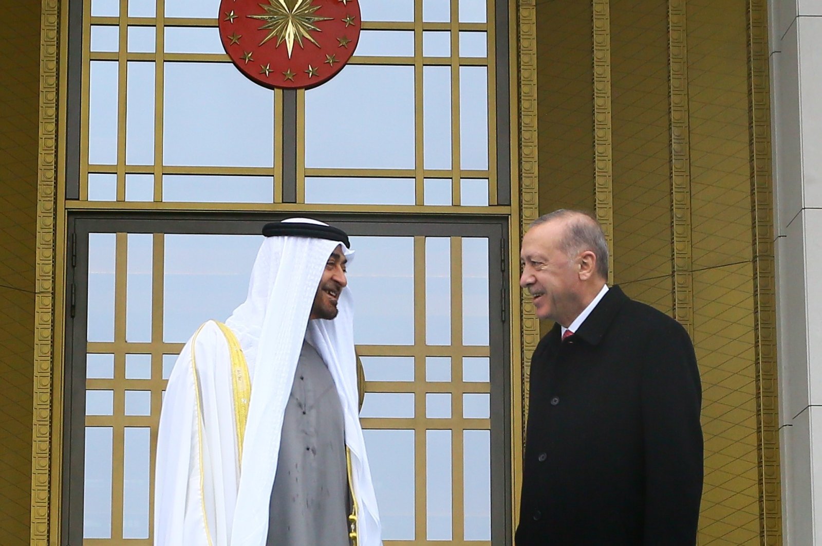 President Recep Tayyip Erdoğan (R) and Abu Dhabi Crown Prince Sheikh Mohammed bin Zayed (MBZ) speak at the entrance of the Presidential Complex, Ankara, Turkey, Nov. 24, 2021. (AA Photo)