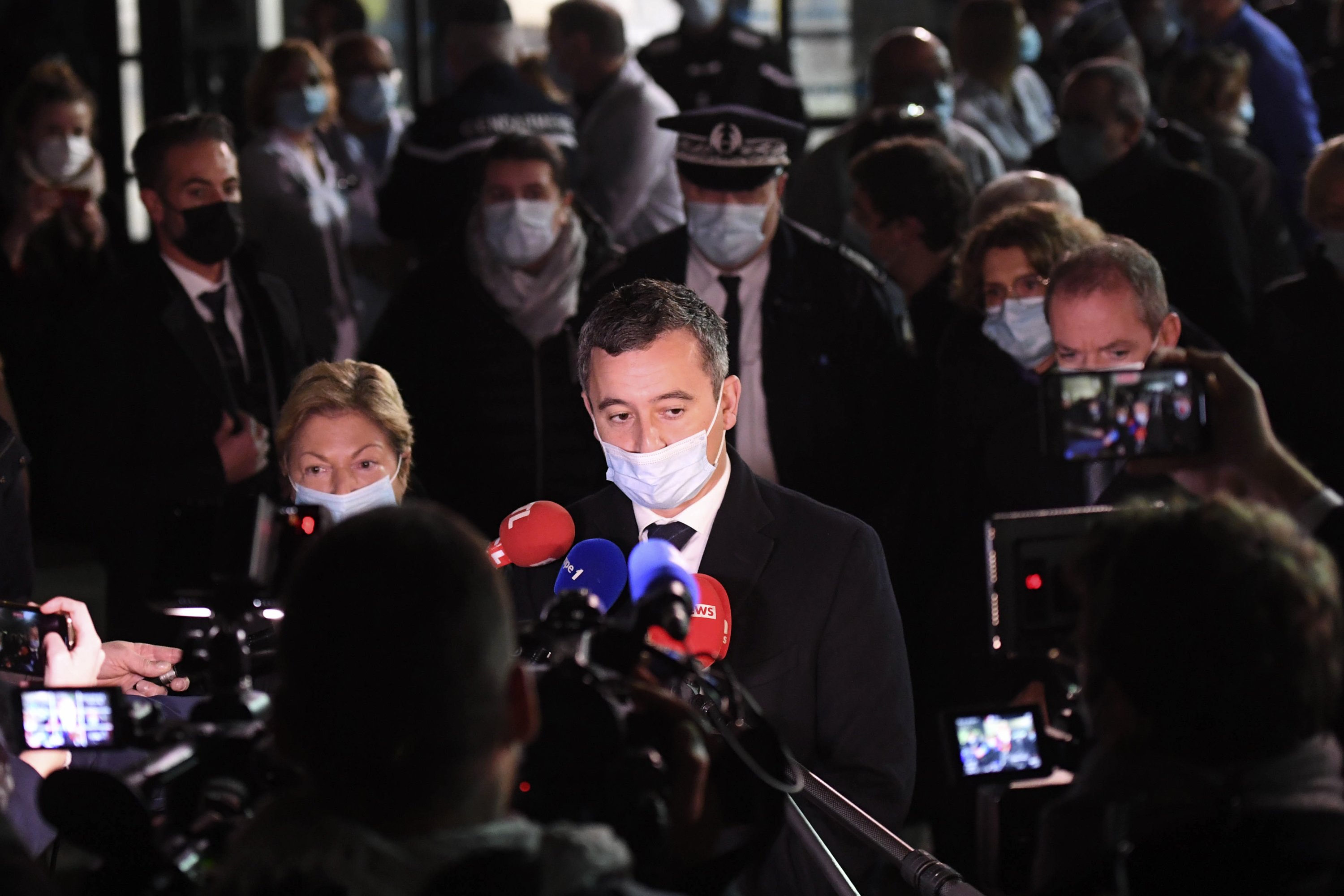 French Interior Minister Gerald Darmanin answers the press in Calais, northern France, Nov. 24, 2021. (AP Photo)