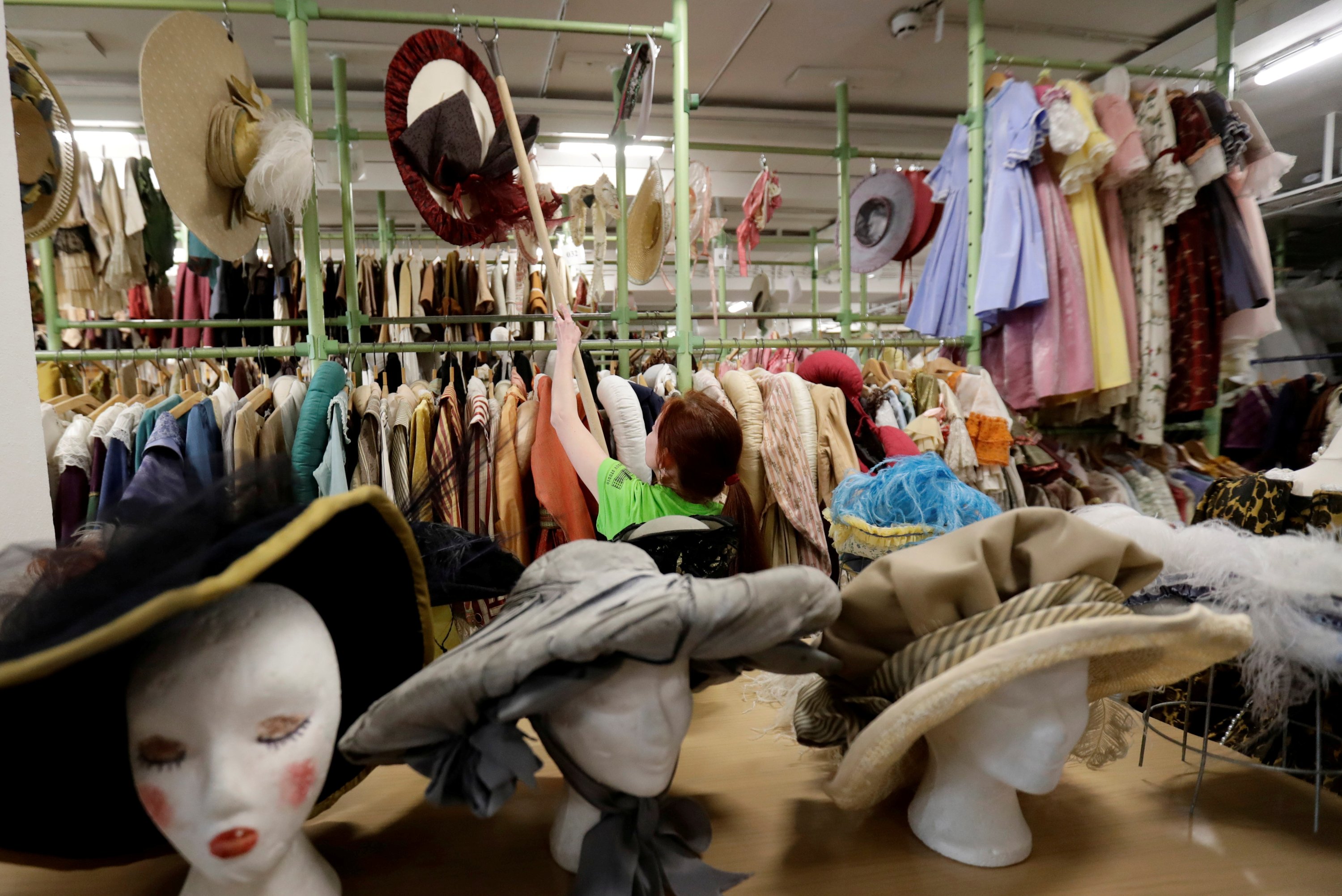An employee works in a costume and props storage of the Barrandov Studio in Prague, Czech Republic, April 8, 2019. (REUTERS)