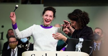 French actress Jeanne Balibar supervises the 161th charity wine action at the Hospices de Beaune, central France, Nov. 21, 2021. (AFP Photo)