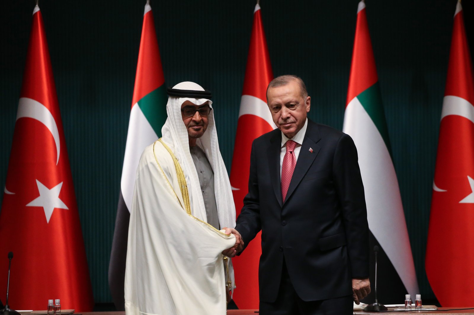 President Recep Tayyip Erdoğan (R) and Abu Dhabi Crown Prince Sheikh Mohammed bin Zayed (MBZ) shake hands during a ceremony after their meeting at the Presidential Palace in Ankara, Turkey, Nov. 24, 2021. (EPA Photo)