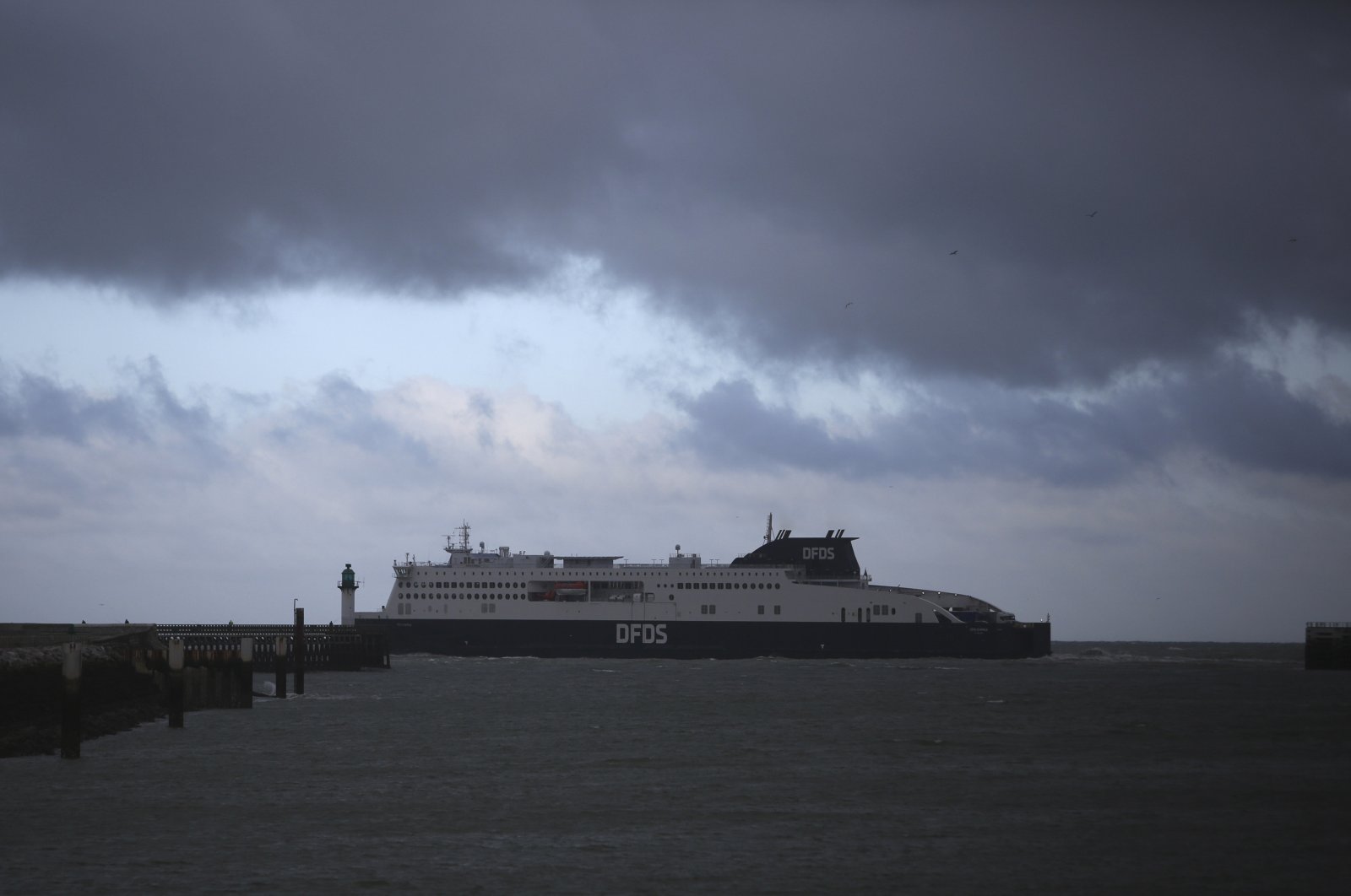 A ferry bound for Britain leaves the port of Calais, northern France, Nov. 25, 2021. (AP Photo)