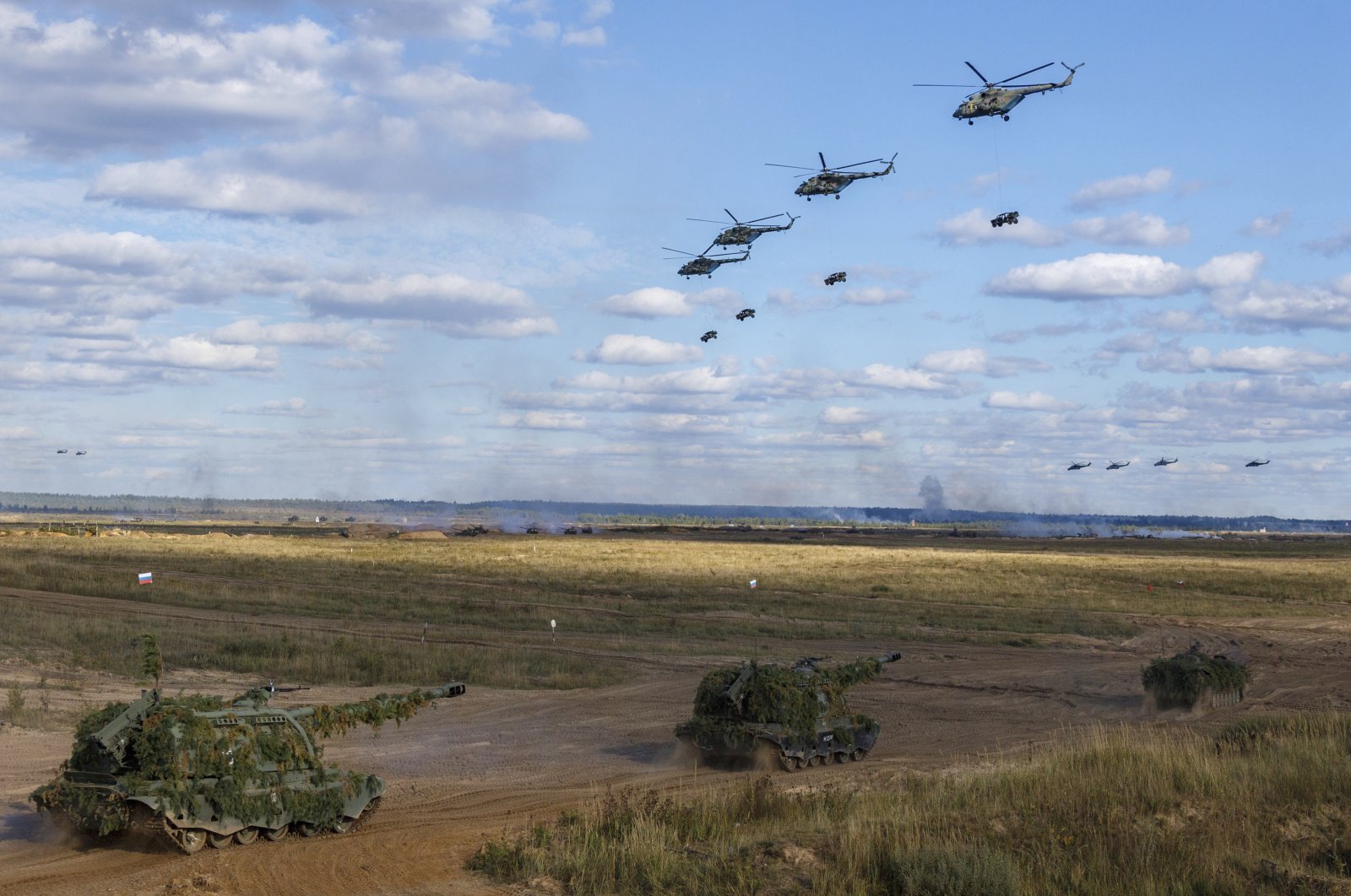 In this photo released by the Russian Defense Ministry Press Service, a view of the joint strategic exercise of the armed forces of the Russian Federation and the Republic of Belarus at the Mulino training ground in the Nizhny Novgorod region, Russia, on Sept. 11, 2021. (AP Photo)