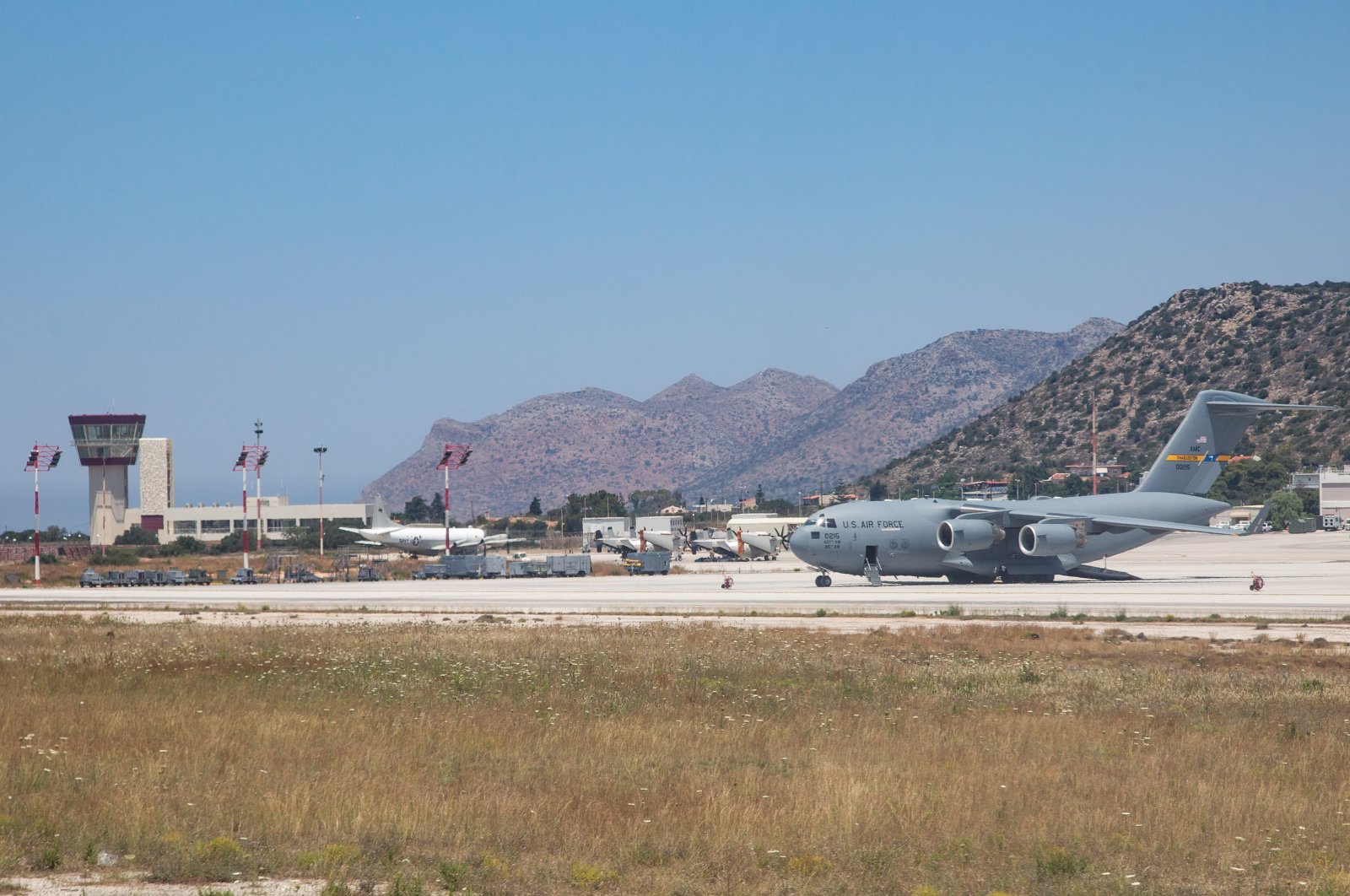 Two United States Air Force planes are seen at Chania International Airport, located near Souda Bay on the island of Crete, Greece. (Reuters Photo)