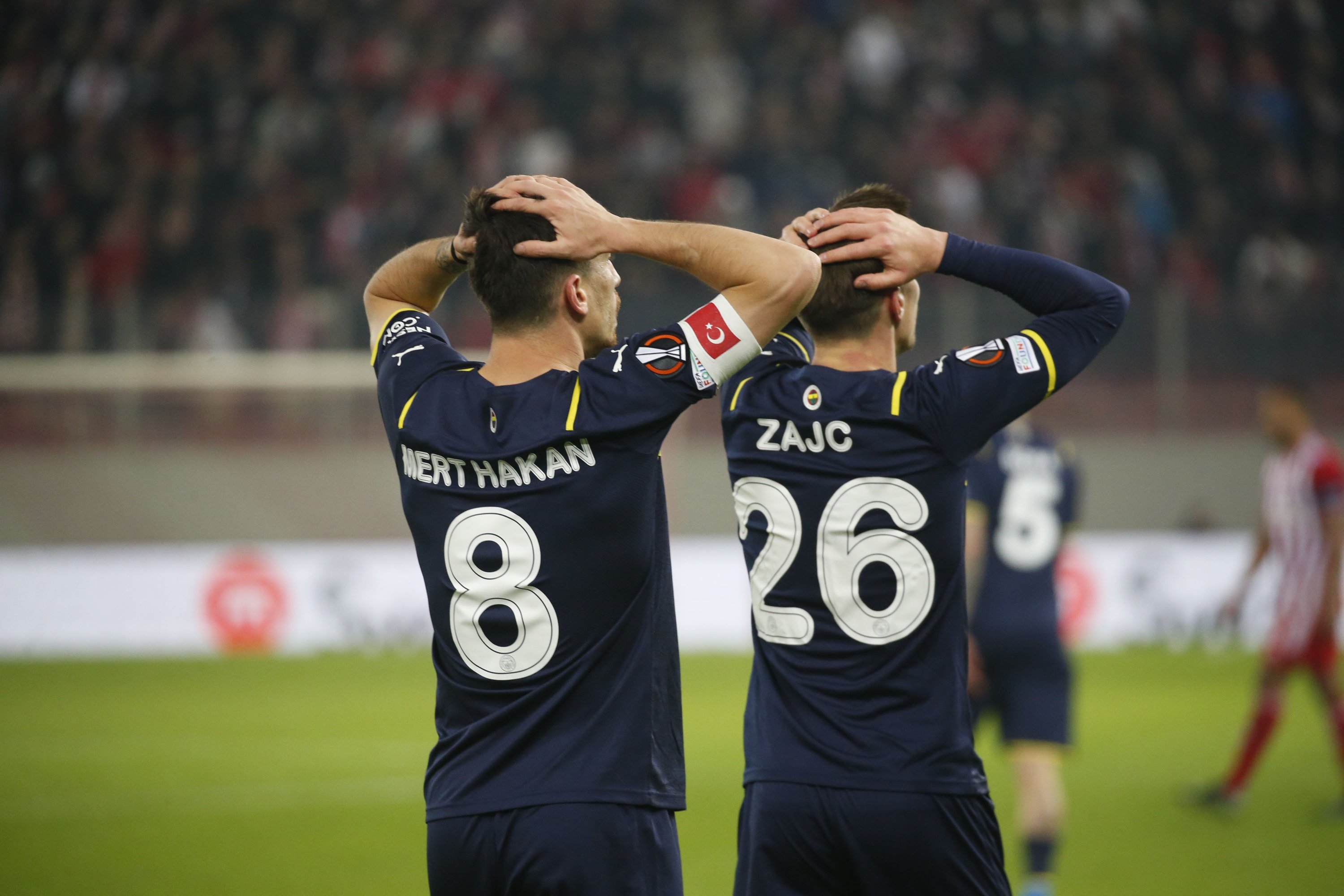 Fenerbahçe players react during a Europa League match against Olympiacos in Pireas, Greece, Nov. 25, 2021. (DHA Photo)