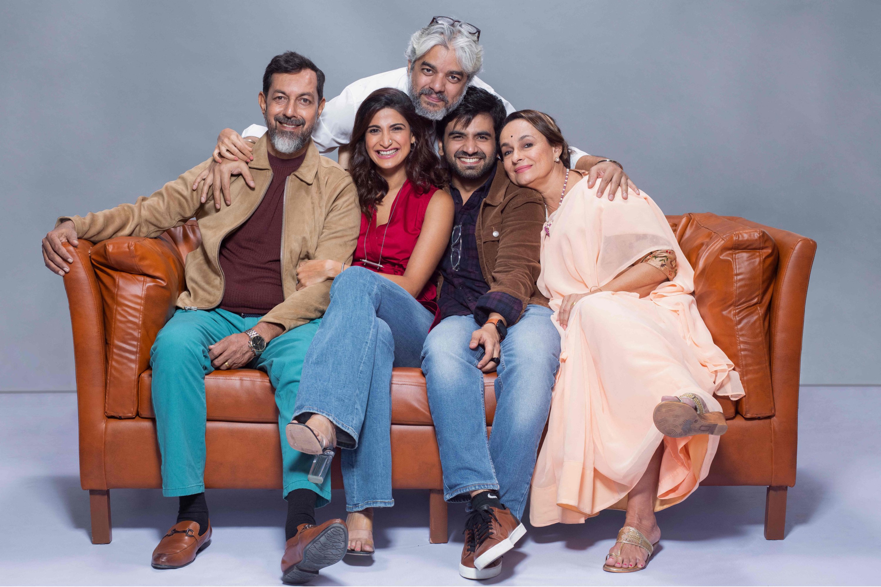 This handout photograph released by Netflix shows Bollywood actors and cast members (L-R) Rajat Kapoor, Aahana Kumra, Ayush Mehra, Soni Razdan posing for pictures with director Shaad Ali (top) during the promotion of the Indian drama web series 