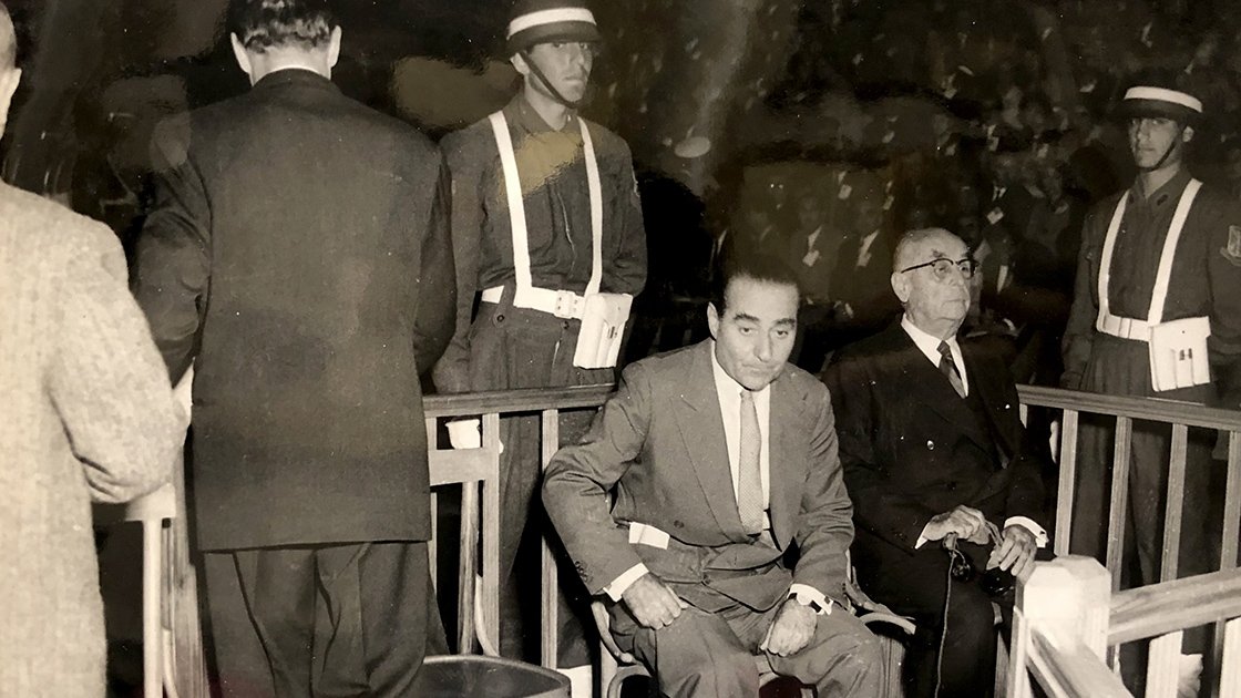 An undated photo taken by a military officer following the 1960 coup shows Adnan Menderes (2nd R) sitting next to then President Celal Bayar during the trial of two men, in Yassıada, Istanbul, Turkey. (Anadolu Agency)