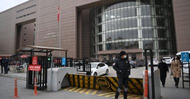 A security member stands guard in front of the Bakırköy courthouse, Istanbul, Turkey, Feb. 24, 2021. (AFP Photo)