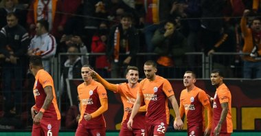 Galatasaray's Romania's midfielder Alexandru Cicaldau (2nd R) celebrates with teammates after scoring a goal during a Europa League match against Olympique de Marseille, Istanbul, Turkey, Nov. 25, 2021. (AFP Photo)