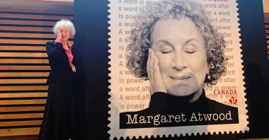 Canadian writer Margaret Atwood poses during the launch of a commemorative stamp by Canada Post in Toronto, Canada, Nov. 25, 2021. (REUTERS)