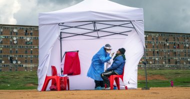 A resident from the Alexandra township gets tested for COVID-19, Johannesburg, South Africa, April 29, 2020. (AP Photo)