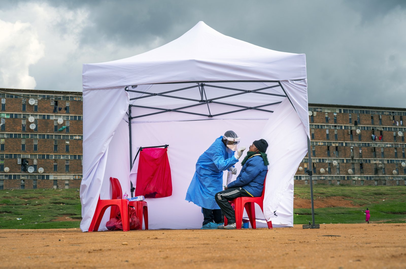 A resident from the Alexandra township gets tested for COVID-19, Johannesburg, South Africa, April 29, 2020. (AP Photo)