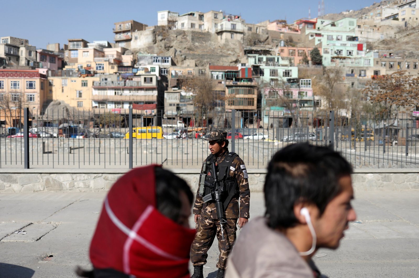A Taliban fighter stands as he guards a checkpoint in Kabul, Afghanistan, Nov. 27, 2021. (Reuters Photo)