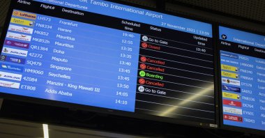 A flight information board shows canceled flights at OR Thambo International Airport as restrictions on international flights from South Africa start to take effect after the announcement of the new omicron variant, Johannesburg, South Africa, Nov. 27 2021. (EPA Photo)