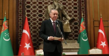 President Recep Tayyip Erdoğan receiving the Turkmenistan State Cooperation Order in Ashkabat, Turkmenistan, Nov. 27, 2021 (IHA Photo)
