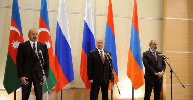 Azerbaijani President Ilham Aliyev, Russian President Vladimir Putin and Armenian Prime Minister Nikol Pashinian after their meeting in Sochi, Russia, Nov. 26, 2021. (AFP Photo)