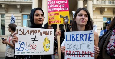 Women join a demonstration organized by "Stand up to Racism" outside the French embassy in London, Aug. 26, 2016. (Getty Images, File)