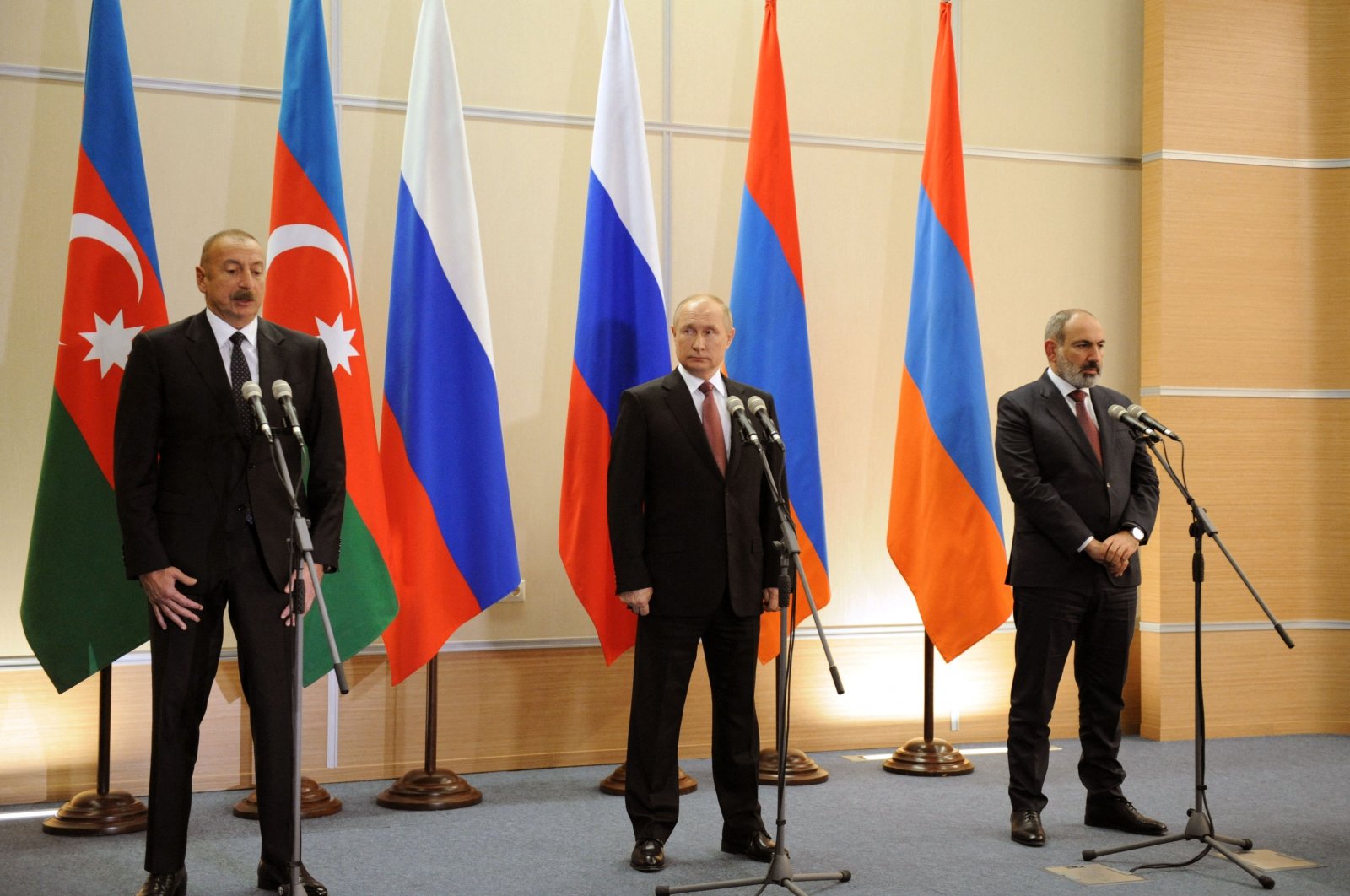 Azerbaijani President Ilham Aliyev, Russian President Vladimir Putin and Armenian Prime Minister Nikol Pashinian after their meeting in Sochi, Russia, Nov. 26, 2021. (AFP Photo)