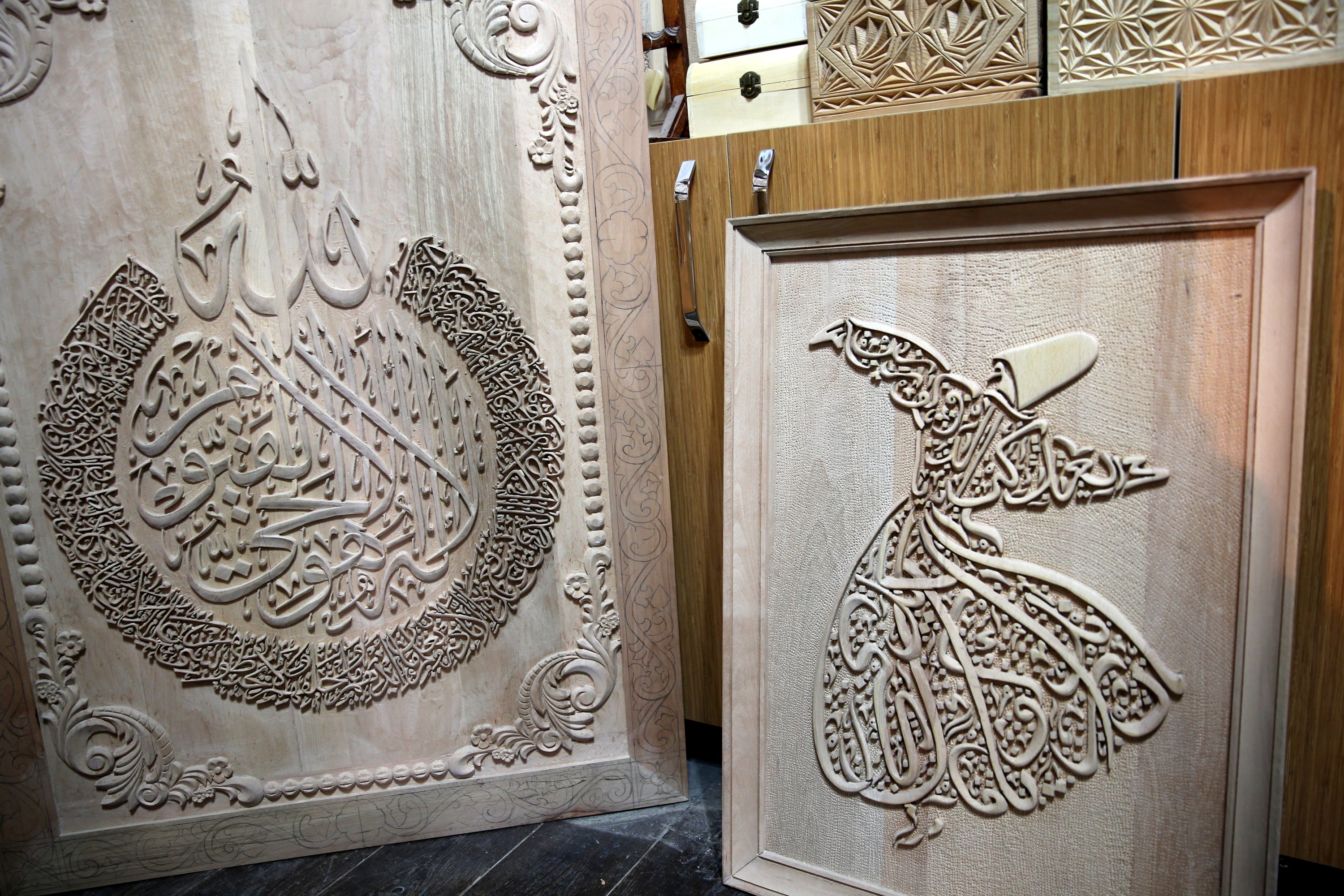 Two wood-carved panels by Süleyman Daştan, Sivas, central Turkey, Nov. 18, 2021 (AA Photo)