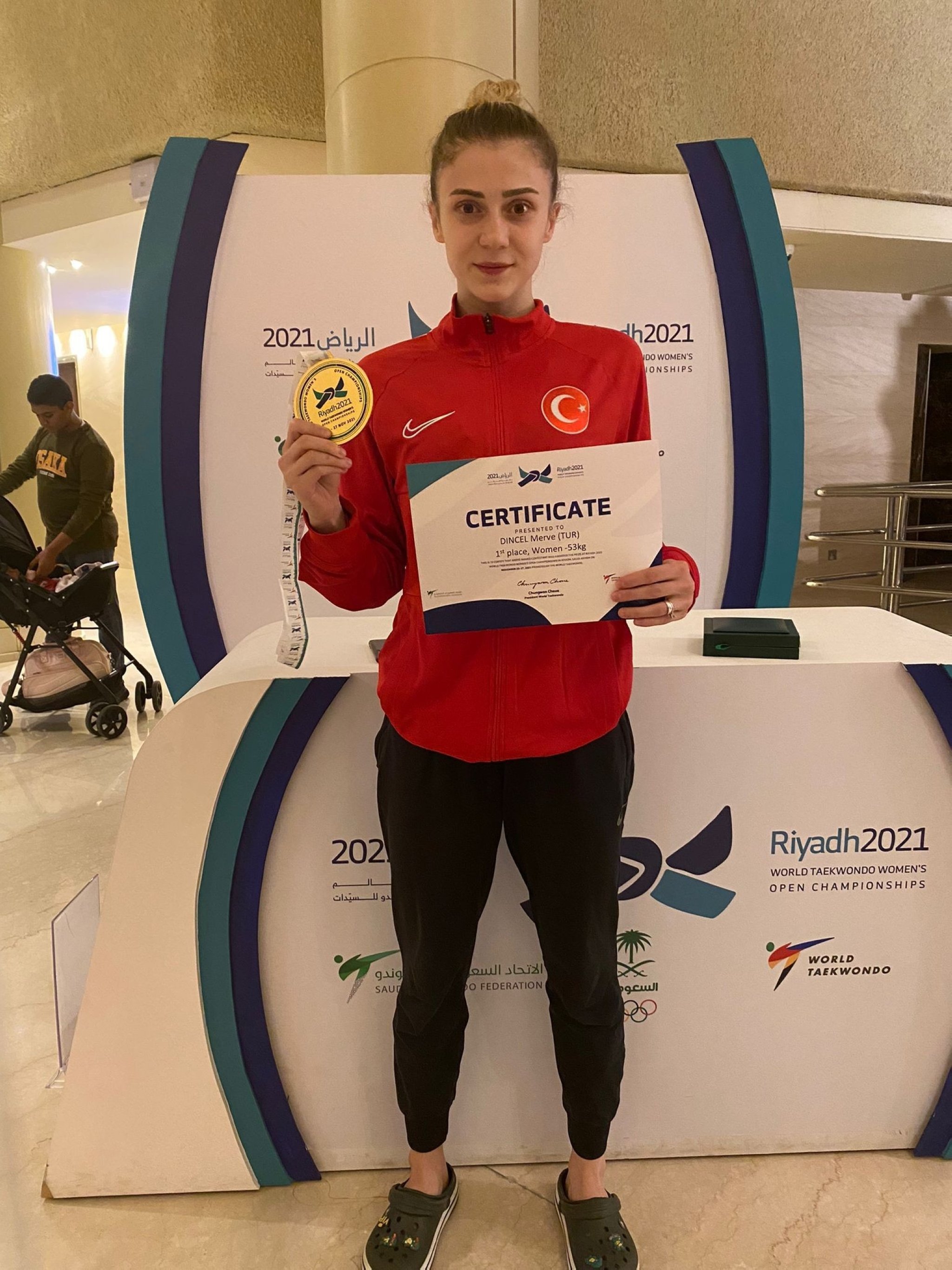 World Taekwondo Champion Mamak Municipality athlete Merve Dinçel can be seen with her medal and certificate, Riyadh, Saudi Arabia, Nov. 29, 2021. (IHA Photo)