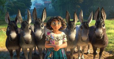 This image released by Disney shows Mirabel, voiced by Stephanie Beatriz, in a scene from the animated film &quot;Encanto.&quot; (AP)