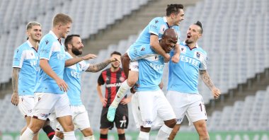 Trabzonspor players celebrate a goal against Fatih Karagümrük in a Süper Lig match in Istanbul, Turkey, Nov. 28, 2021. (AA Photo)