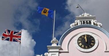 The British Union flag and the national flag of Barbados fly next to each other on a building as preparations take place to mark the Caribbean island&#039;s transition to a republic, in Bridgetown, Barbados, Nov. 29, 2021. (Reuters Photo)