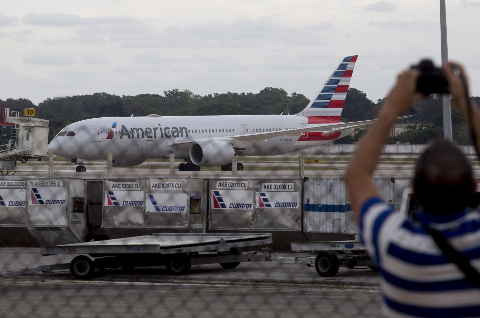 An American Airlines flight that took off from Miami sits on the tarmac at the Jose Marti International Airport in Havana, Cuba, Monday, Nov. 15, 2021. (AP File Photo)