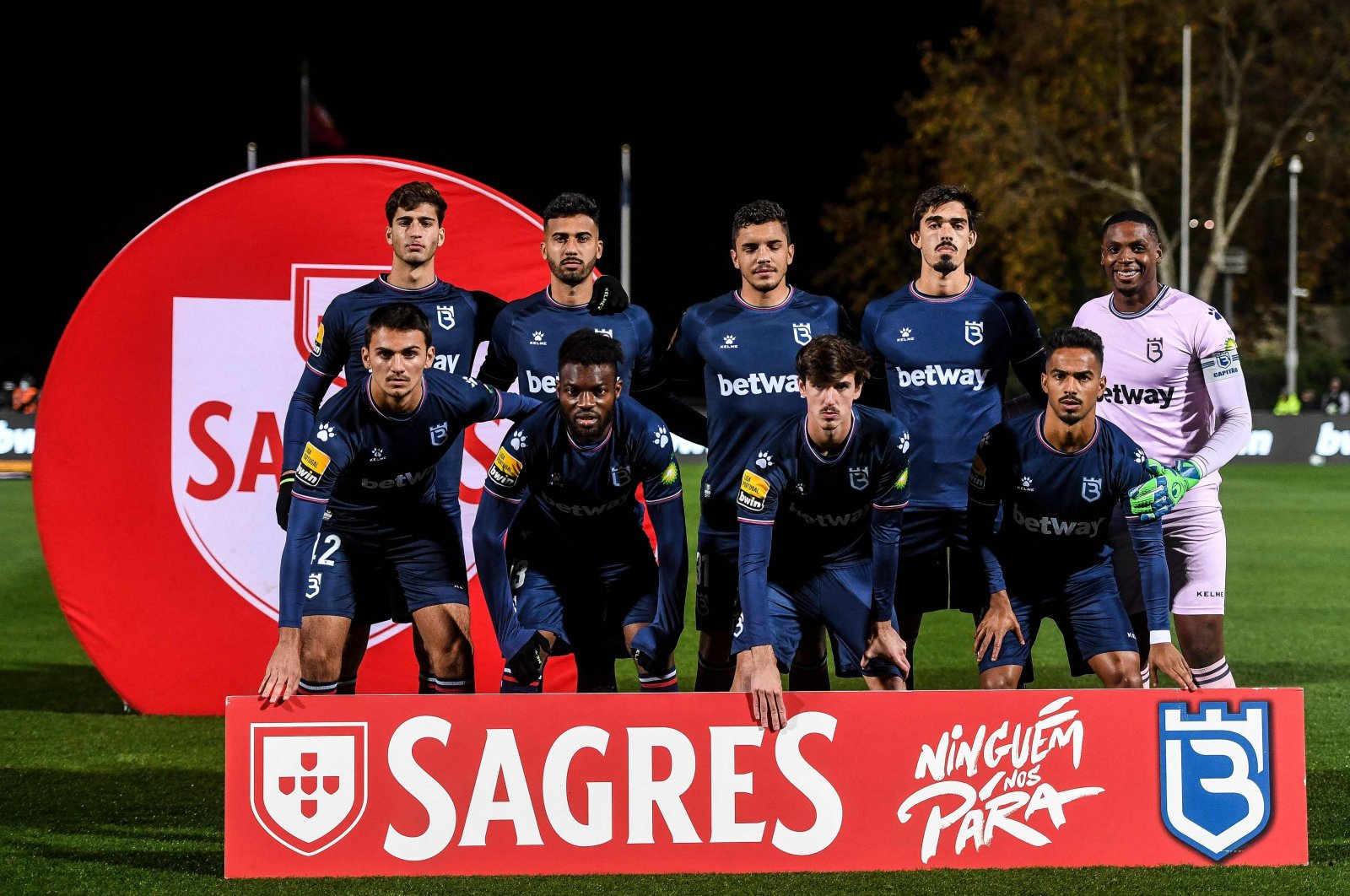 Belenenses players pose before the Portuguese league football match against Benfica at the Jamor stadium in Oeiras, Portugal, Nov. 27, 2021. (AFP Photo)