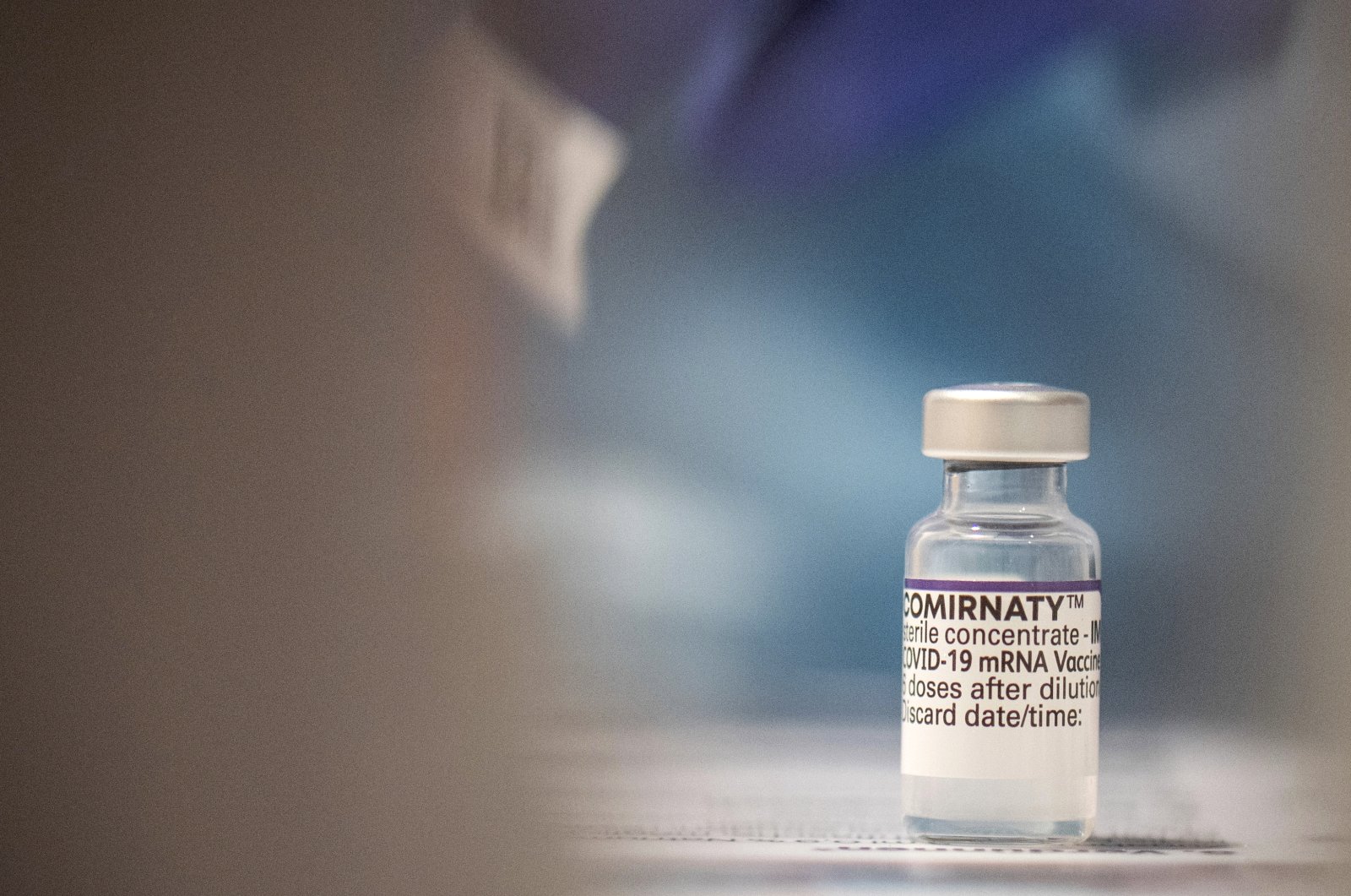 A phial of the BioNTech vaccine Comirnaty stands ready at a vaccination center at the Gesellschaftshaus in Kirn, Germany, Nov. 28, 2021. (AP Photo)