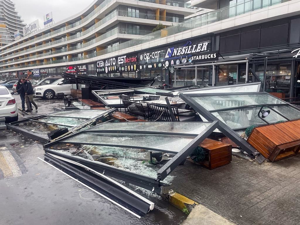 Windows of a cafe torn apart and hurled by strong winds in the Bağcılar district of Istanbul, Turkey, Nov. 29, 2021. (AA Photo)