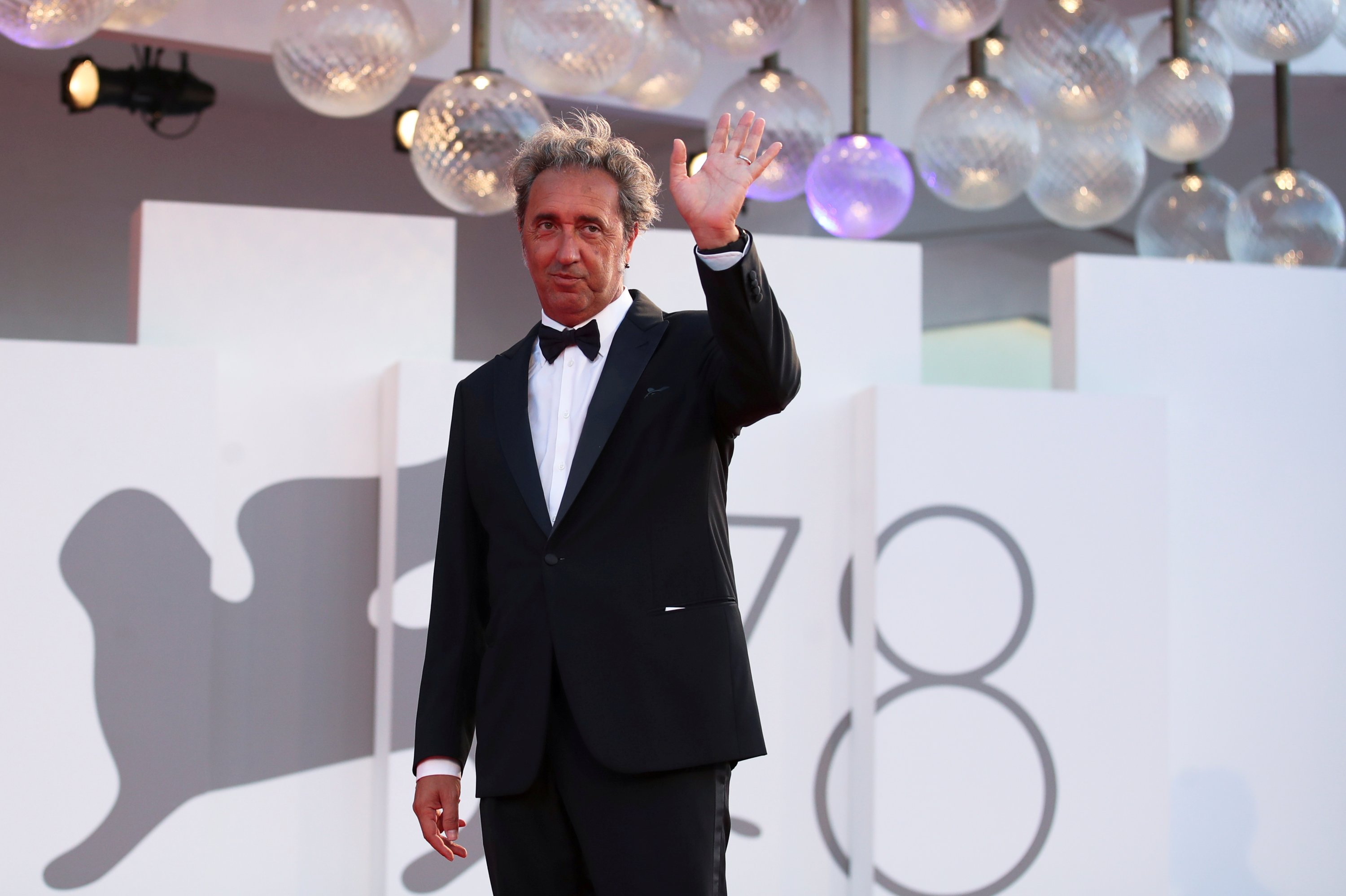 Director Paolo Sorrentino poses at the 78th Venice Film Festival, Venice, Italy, Sept. 2, 2021. (REUTERS)