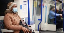 A person wears a face mask on the underground, as the spread of COVID-19 continues in London, U.K., Nov. 30, 2021. (Reuters Photo)