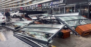Windows of a cafe torn apart and hurled by strong winds in the Bağcılar district of Istanbul, Turkey, Nov. 29, 2021. (AA Photo)