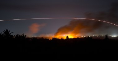 Tracer fire lights up the night sky as U.S.-backed YPG/PKK terrorists fire on the Daesh-held village of Baghouz, Syria, Tuesday, March 12, 2019. (AP File Photo)