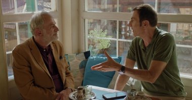 A still shot from “Not So Neighbourly Affair” shows Branko Duric (R) as Enis and Izudin Bajrovic as Izo.